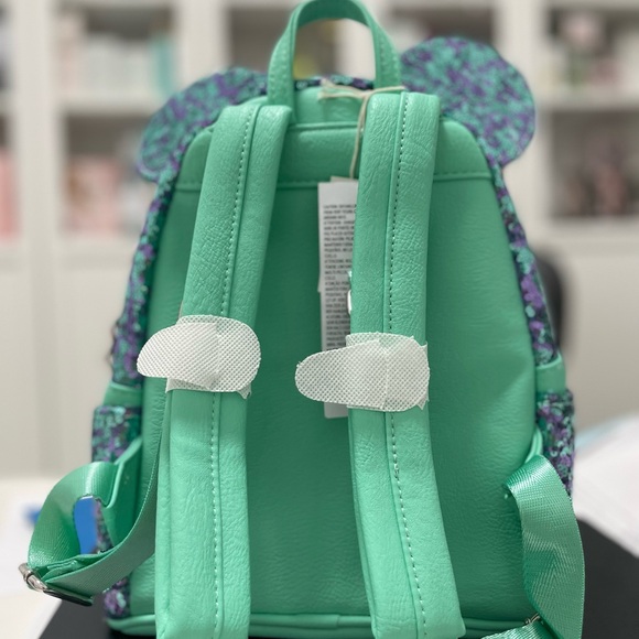 Minnie Mouse Sequin Loungefly.
Mini Backpack - Blue and Purple - Picture 2 of 4